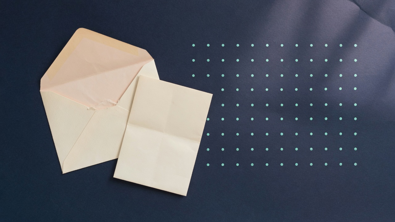 An open cream envelope and a folded letter beside a grid of teal dots on navy paper